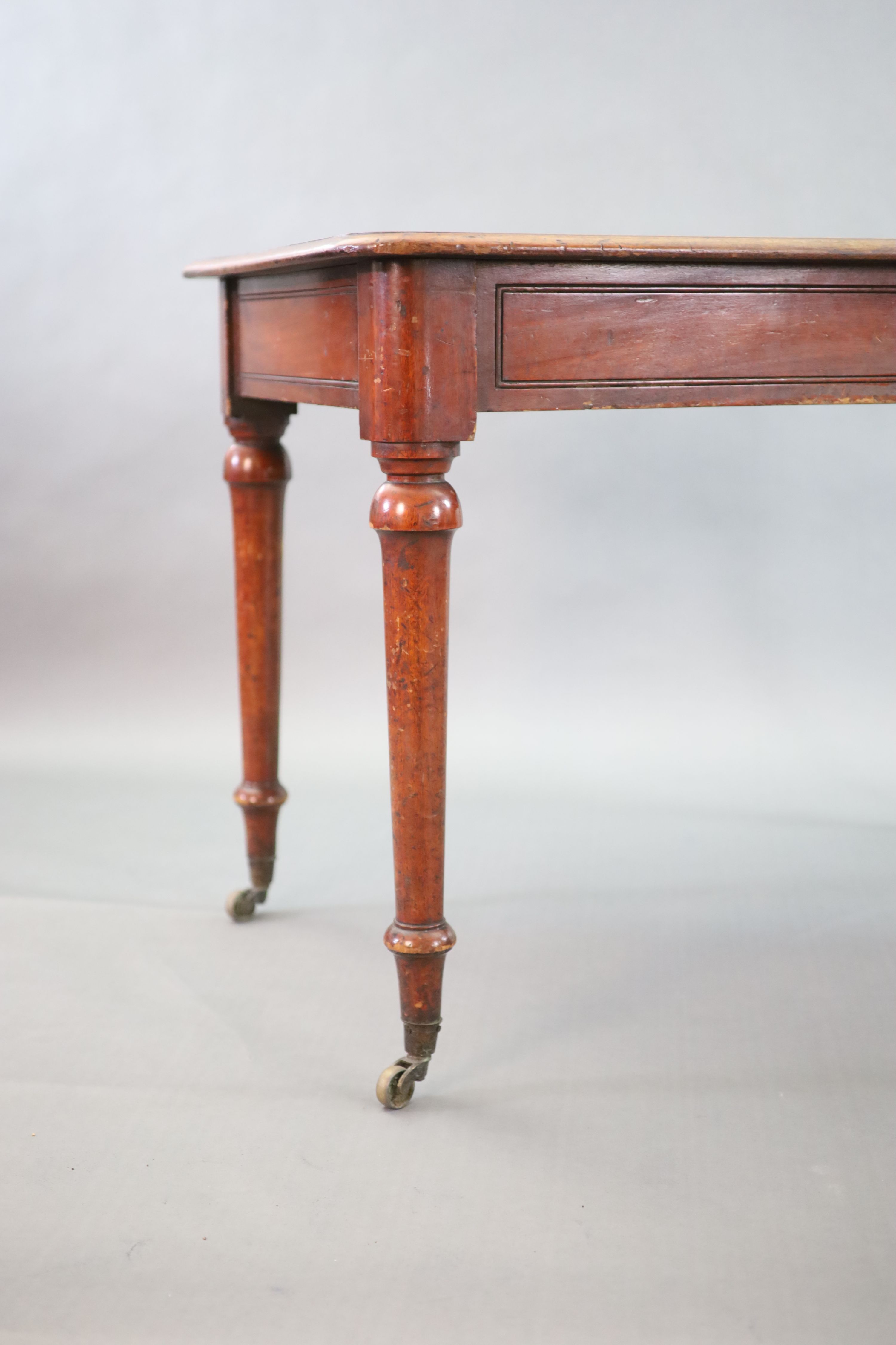 A Victorian mahogany writing table, W.114cm D.70cm H.77cm